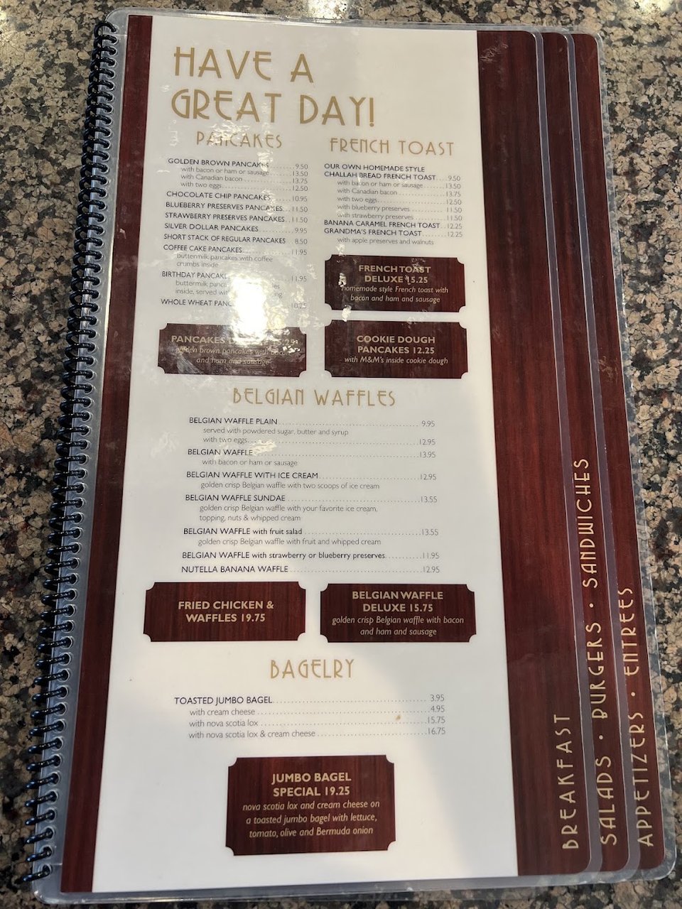 Classic diner menu featuring eggs and hot sandwiches.